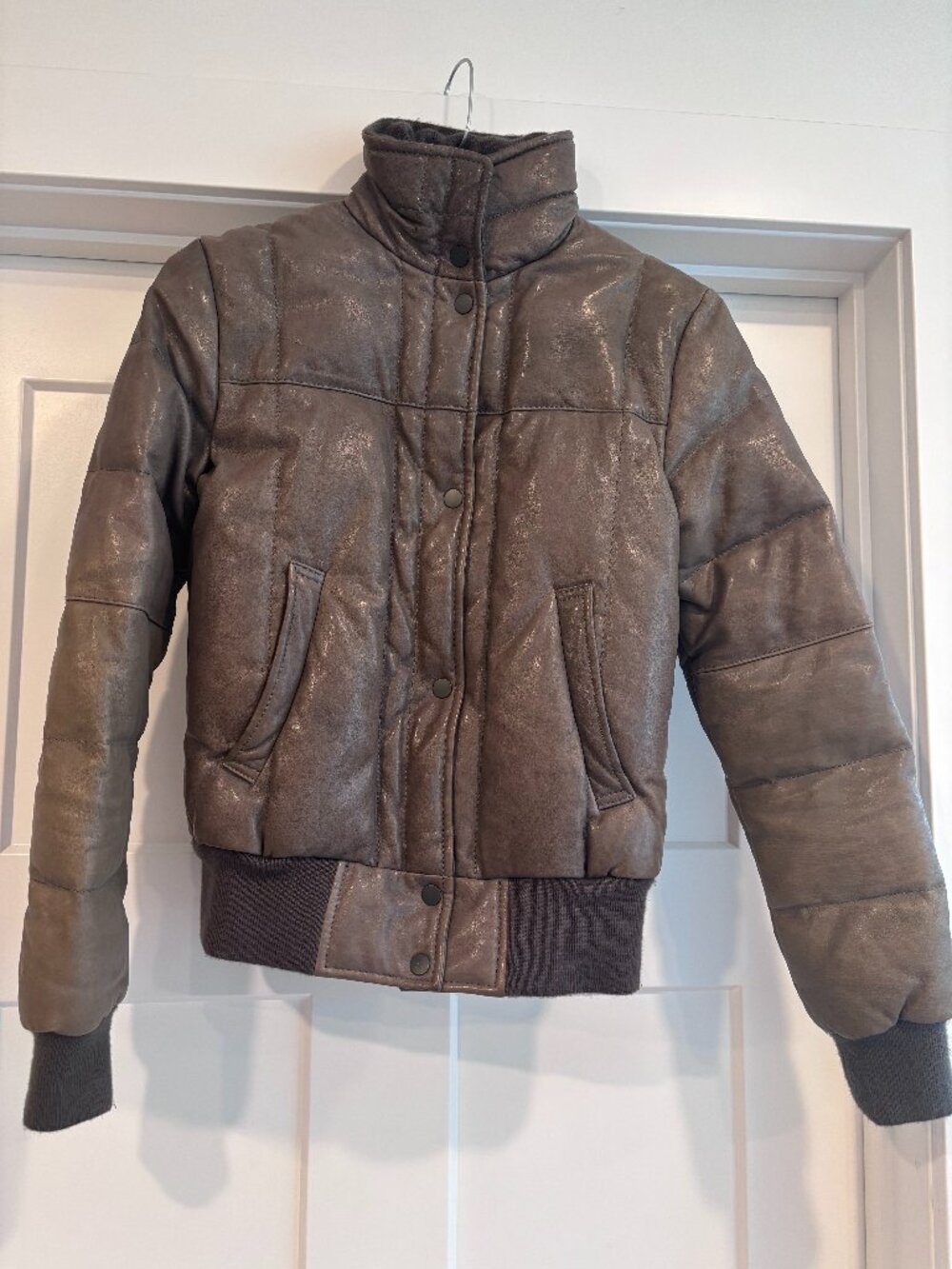 Grey genuine leather puffer-style bomber jacket.